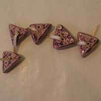 Boutons triangles Violets