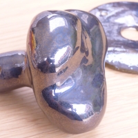 Bouton de porte métallisée